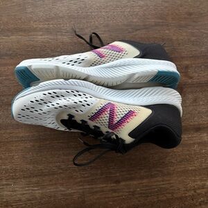 New Balance Cream and Black Athletic Shoes